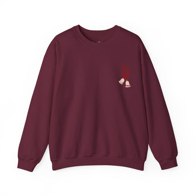 Vintage Merry Christmas crewneck sweatshirt in burgundy with bell and Santa sleigh holiday design by Brew’d Up Designs