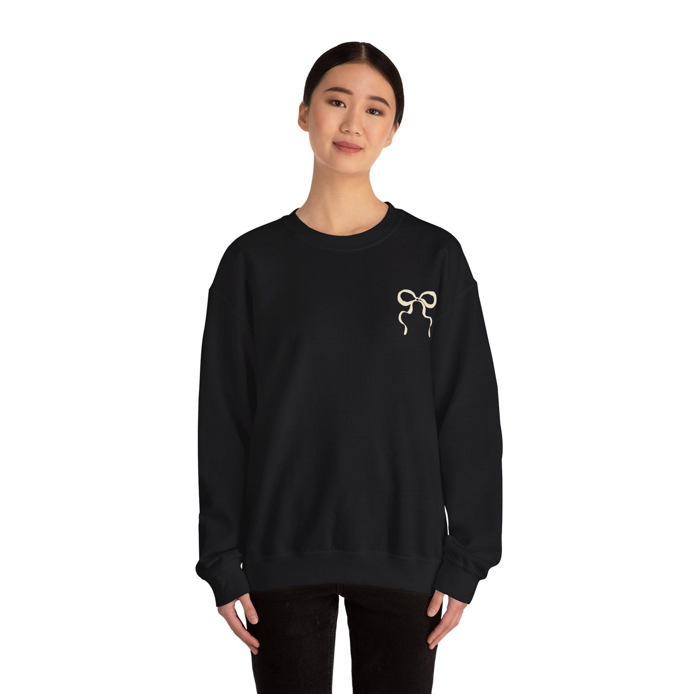 Coquette Christmas Faith Crewneck sweatshirt in black with coquette bow design, unisex heavy blend cotton-polyester, cozy holiday attire