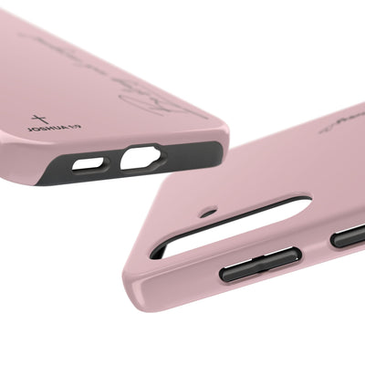 Pink inspirational tough phone case with "Be Strong and Courageous" Joshua 1:9 design, dual-layer protection for iPhone and Samsung.