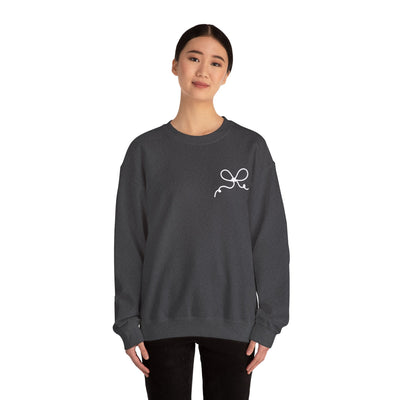 woman wearing black Coquette Bow Crewneck Sweatshirt with white bow design on chest