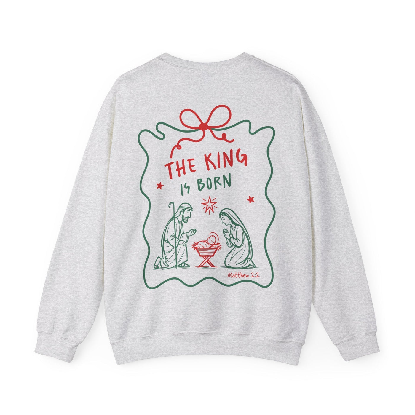 Coquette Bow Crewneck Sweatshirt with festive "The King is Born" faith design on back in red and green.