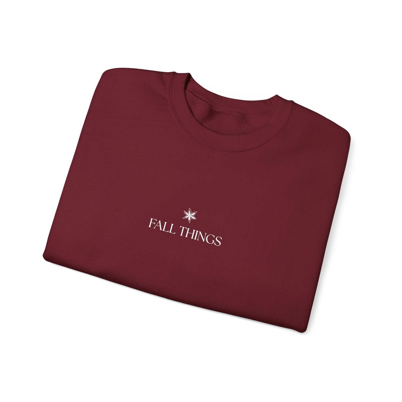 Folded burgundy Fall Things Sweatshirt with minimalist design for autumn coffee lovers and homebodies