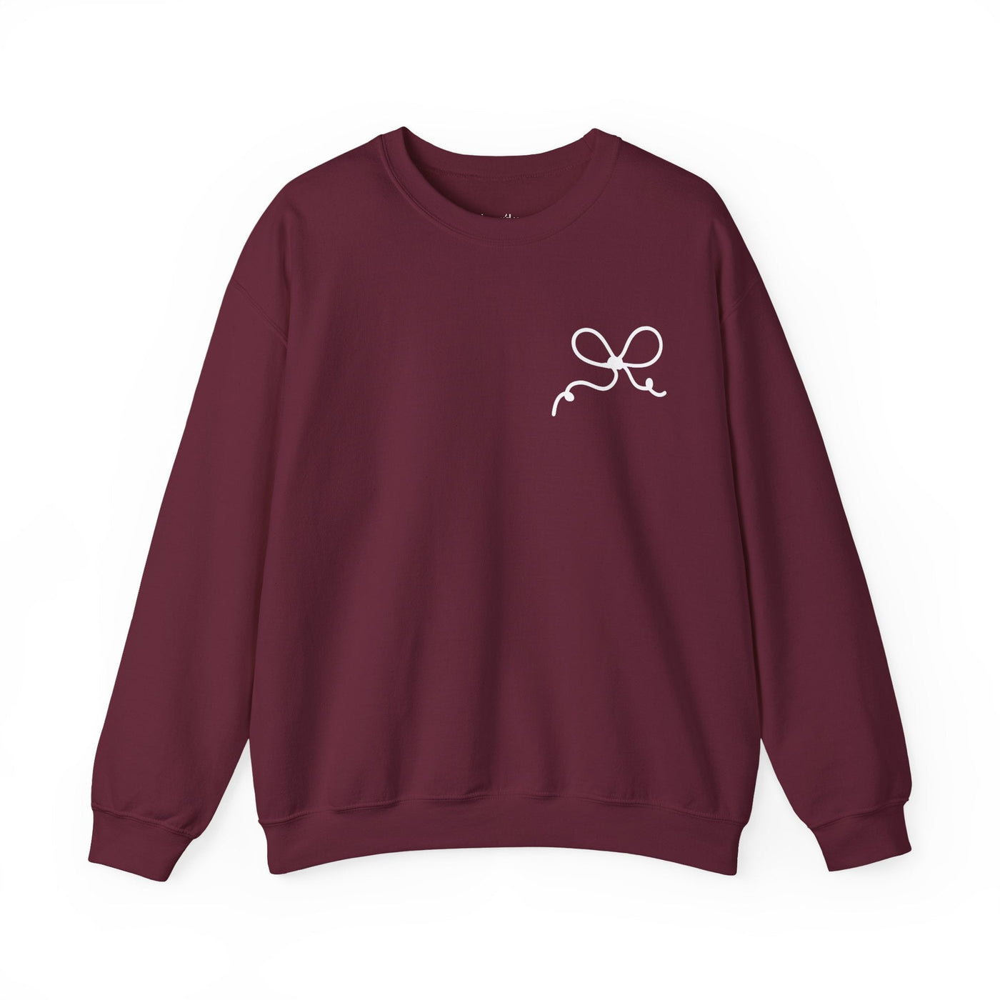 Maroon Coquette Bow Crewneck Sweatshirt with front bow design and festive "The King is Born" faith theme