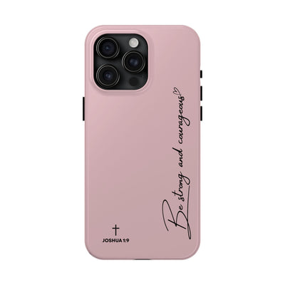 Pink inspirational tough phone case with "Be strong and courageous" text and Joshua 1:9 scripture, dual-layer durable design for iPhone.