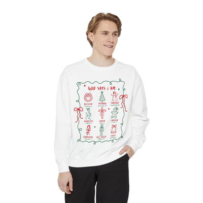 Man wearing white "God Says I Am" inspirational crewneck sweatshirt with Christmas-themed embroidered Bible verse design