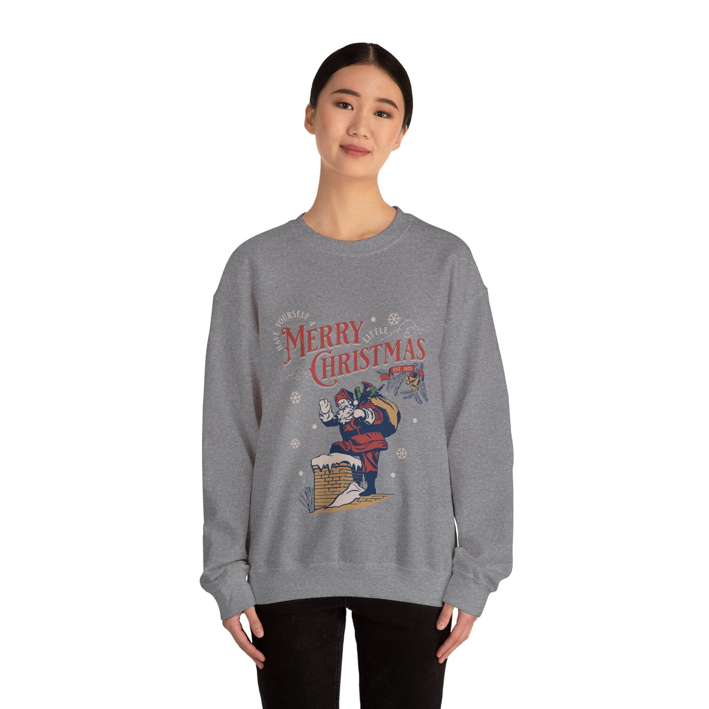 woman wearing gray vintage santa crewneck sweatshirt with santa carrying gift bag going into chimney holiday design