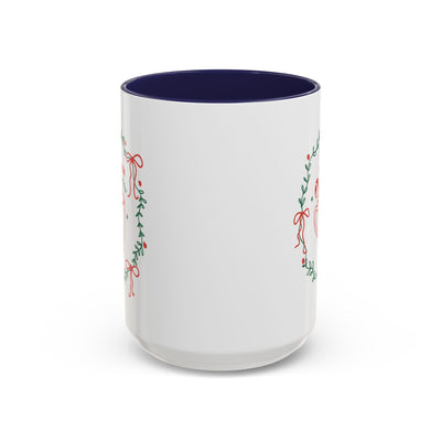 White ceramic mug with festive greenery design and dark blue interior in 11oz and 15oz sizes