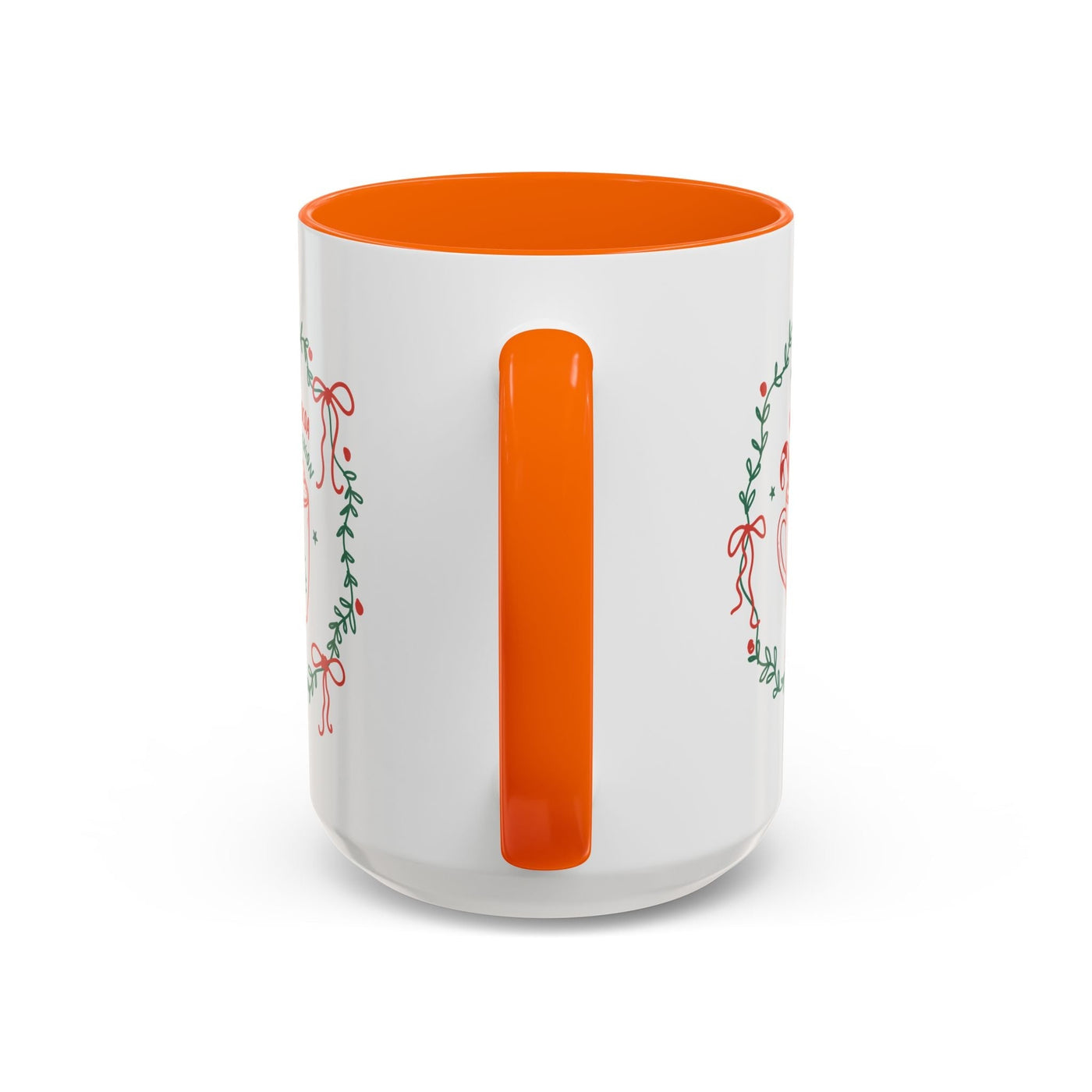 White ceramic mug with orange handle and interior, festive greenery design, available in 11oz and 15oz sizes