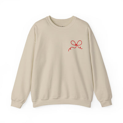 Coquette Bow Crewneck Sweatshirt in beige with red bow design, festive and comfortable cotton-poly blend, unisex adult size.