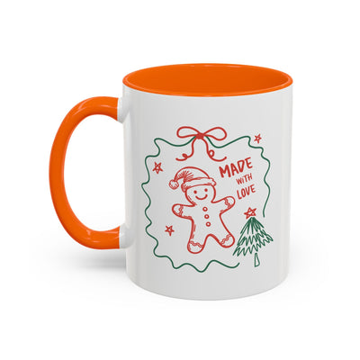 Festive Christmas coffee mug with orange handle and interior, featuring gingerbread man and tree design with "Made with Love" text, ceramic 11oz and 15oz options