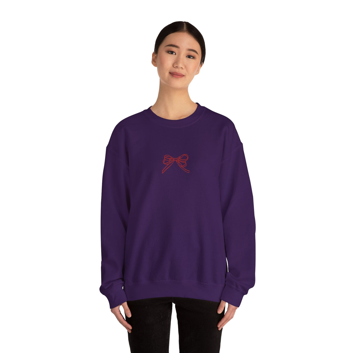 Purple Holiday Bow Crewneck Sweatshirt with festive bow design, classic fit for adults
