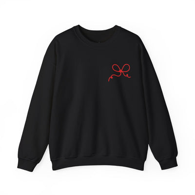 Black Coquette Bow Crewneck Sweatshirt with red bow design on front and back, featuring "The King is Born" faith message.