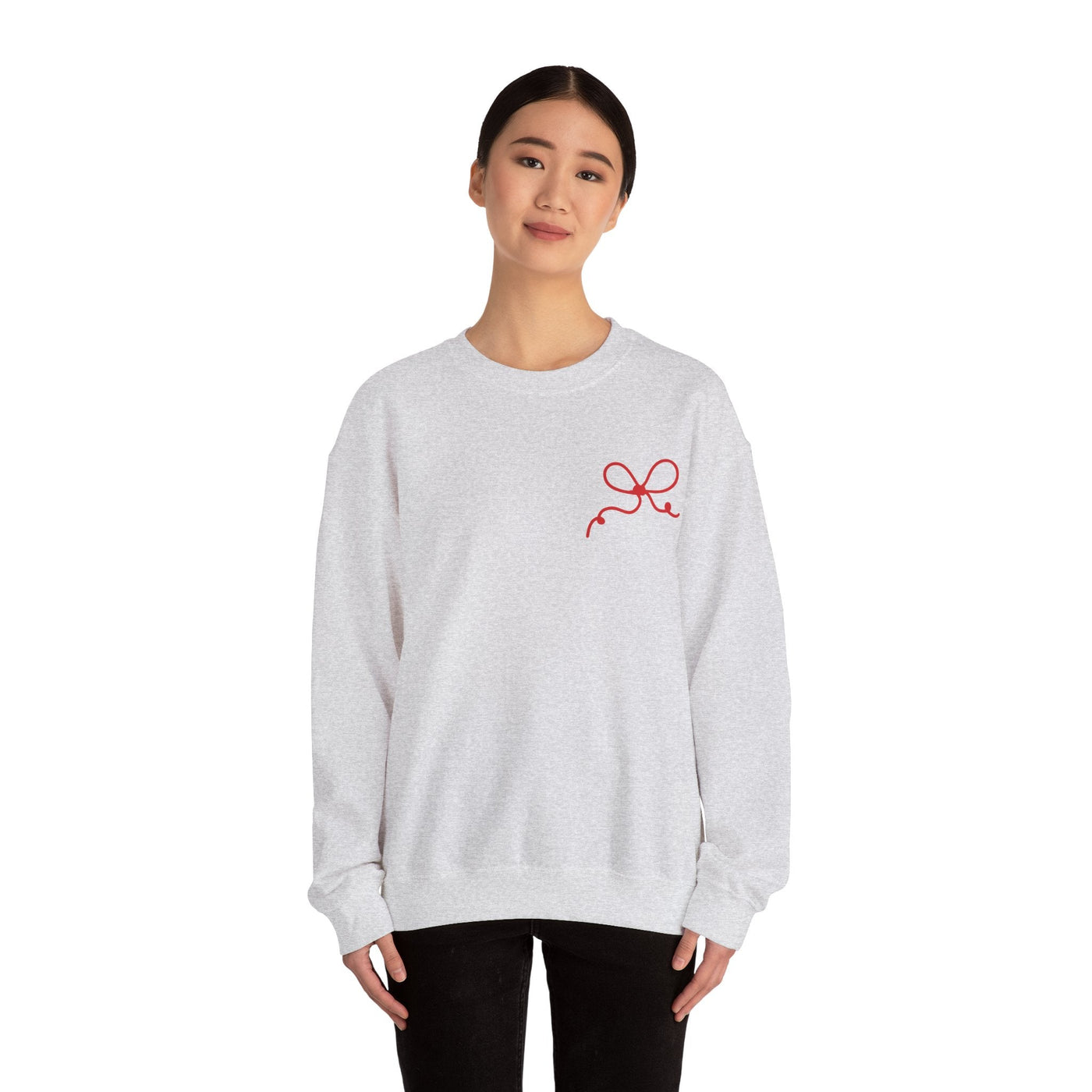 woman wearing grey Coquette Bow Crewneck Sweatshirt with red bow design on chest, casual fit, long sleeves