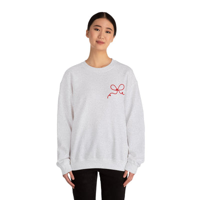 woman wearing grey Coquette Bow Crewneck Sweatshirt with red bow design on chest, casual fit, long sleeves
