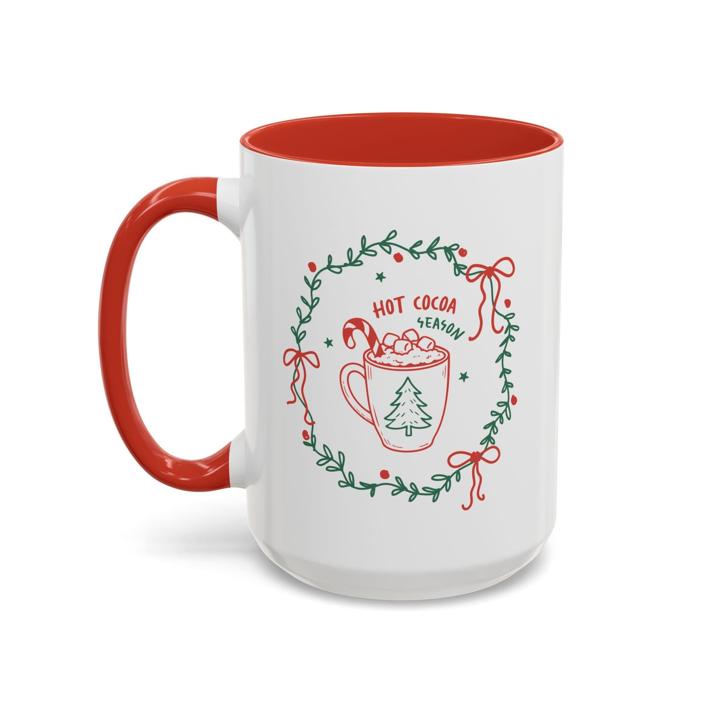 White ceramic mug with red interior and handle, festive hot cocoa season design with greenery wreath and candy cane illustration