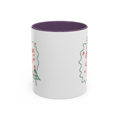 Minimalist festive Christmas coffee mug with white ceramic exterior and purple interior, 11oz size, holiday design with Christmas tree and text.