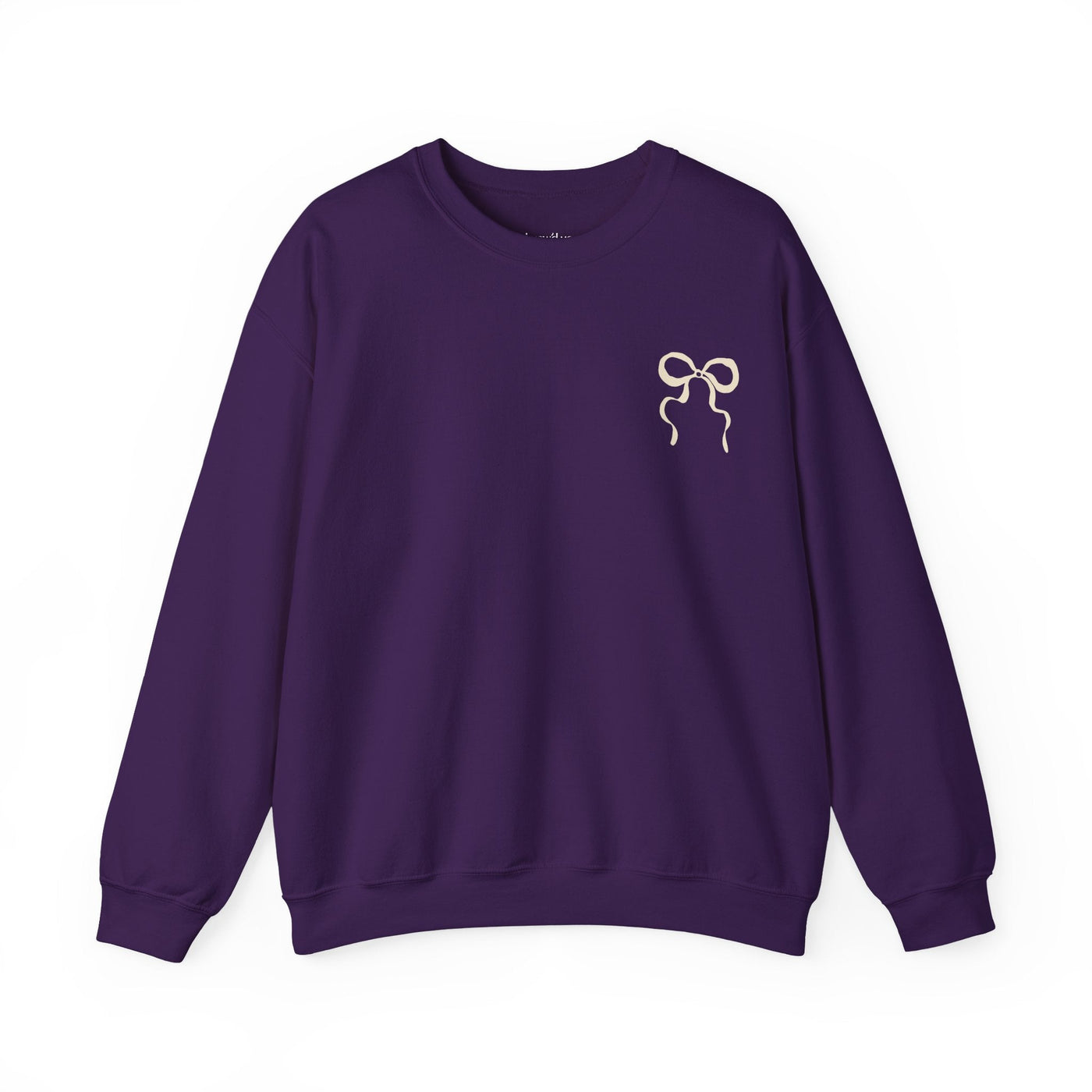 Coquette Christmas Faith Crewneck sweatshirt in purple with coquette bow design on front and inspirational holiday text on back