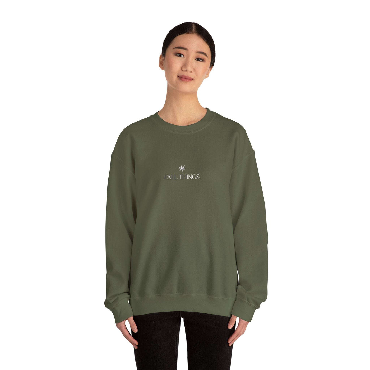 woman wearing olive green Fall Things Sweatshirt cozy minimalist autumn crewneck