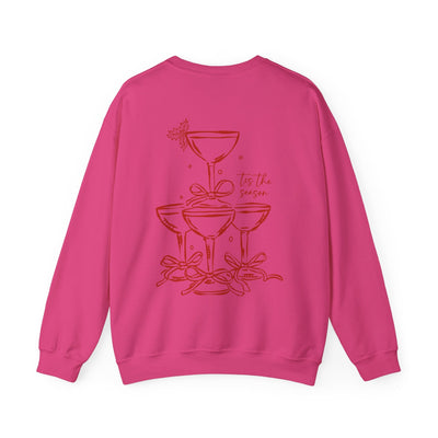 Pink Holiday Bow crewneck sweatshirt with festive champagne tower design and 'Tis the Season text on the back