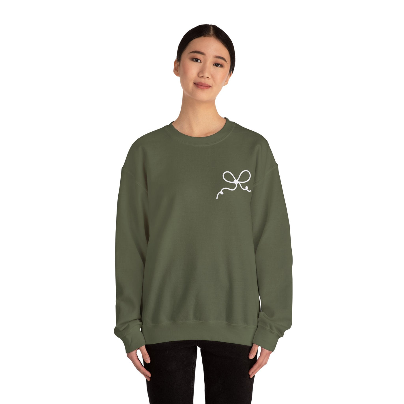 Olive green Coquette Bow Crewneck Sweatshirt with front white bow design, worn by woman